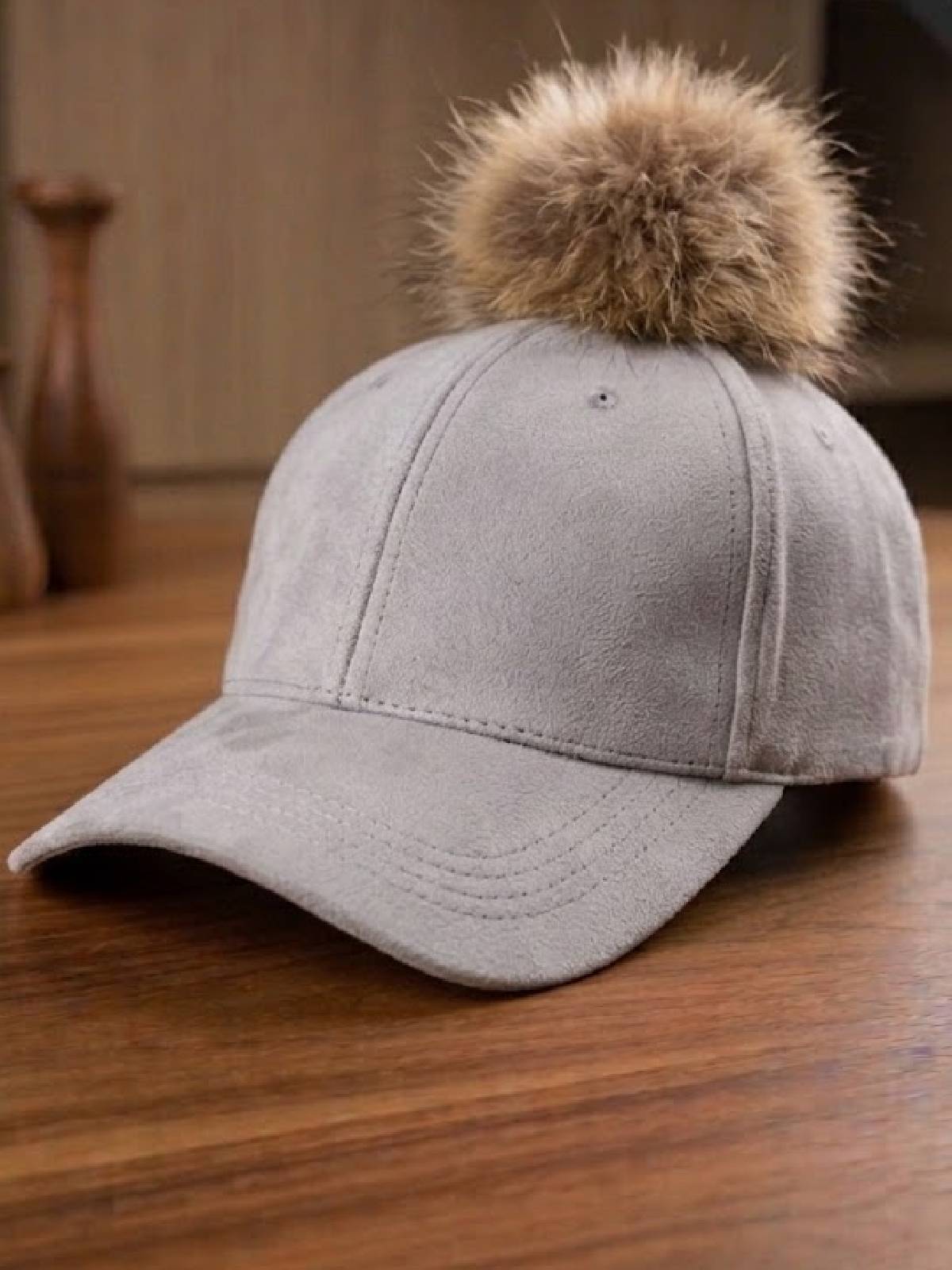GORRA POMPÓN GRIS